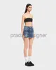 تنانير للسيدات مصممة الصيف تنانير 2024SS Spring New P Metal Triangle Decoration Denim Skirt Women's High Weist Slim Wrap Hip Short Short Emprositile