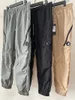 2024 Mens Pants Sports Leisure Nylon Pants Zipper Solid Color Snabbtorkning Vattentäta byxor Herrlinsglasögonbyxor 230226