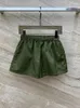 Pantaloncini da donna Tessuto di nylon moda Verde Casual per donna 2024 Pantaloni corti applicati in vita elastica di alta qualità primaverile Lady