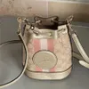 70% Factory Outlet Off Dempsey Mini Drawstring Bucket Bag Fragrant Blae One Crossbody Old Flower Wanderercode в продаже