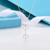 Collier Tiffanyco de créateur High Edition T Family Tassel Full Diamond Heart Collier avec placage en or rose 18 carats sur cuivre blanc pour femme personnalisé Fashion Versa