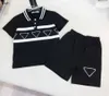 Brand Baby TrackSuits T-Shirt Zestaw dla dzieci Designer Ubrania Rozmiar 90-150 cm Dwuczęściowy zestaw geometryczny logo koszula polo i koronkowe szorty 24MAR
