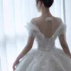 Ilusión Corpiño Mangas cortas Una línea Vestidos de novia Apliques de encaje con cristales Tren de barrido Tallas grandes Vestido de novia vestido de novia