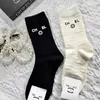 جوارب الجوارب النسائية مصممة فاخرة اللون الصلب للنساء INS Socks All-Match Mid Tube Cotton Pure Cotton