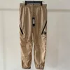 2024 Mens Pants Sports Leisure Nylon Pants Zipper Solid Color Snabbtorkning Vattentäta byxor Herrlinsglasögonbyxor 230226