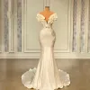 Abiti da sposa vintage Dubai Arabia Saudita con perle a sirena Sexy con spalle scoperte Abiti eleganti con volant in raso avorio Boho Abiti da ricevimento country personalizzati