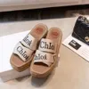 Chlloe Designer Sandals Slipper Sandal 2024 Summer Ny Cross Letter Tryckt Tjock Sole Elevated Woven Bag Rope Beach For Woody Women B5YW