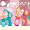 Jeux de nouveauté Jouets de bain pour bébé Hot Big Bubble Gun Machine à bulles automatique pour enfants Machine de fabrication de bulles de ventilateur de dessin animé Q240307
