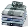 Été 100% coton hommes à manches longues Oxford affaires décontracté Plaid rayure Fit hommes concepteur grande taille hommes chemise S-5XL 240307