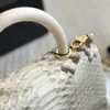 Sac à bandoulière de luxe pour femmes, sac à bandoulière de styliste, matériau en peau de vache, sensation de cuir de lézard, boucle matérielle, paquet de chaîne en métal, sac matelassé cousu à la main