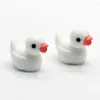 Dekoratif Çiçekler 50/100 PCS Renkli Mini Duck Heykelcik Reçine Ördek Küçük Mera Heykeli Cabochon Micro El Sanatları Süs Minyatürler DIY