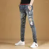 Jeans para hombres Camuflaje Patchwork Azul Hombres Streetwear Casual Slim Fit Pantalones de mezclilla rectos