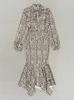 Robes décontractées 2024 Femmes sexy motif léopard robe col rond à lacets à manches longues moulante asymétrique plissée cocktail soirée robe