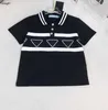 Varumärke Baby Tracksuits Lapel T-shirt Set Kids Designer Kläder STORLEK 90-150 cm Tvådelar Set Geometric Logo Polo Shirt och snörning av shorts 24mar
