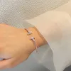 Bracciale aperto con doppia T con diamanti di vendita caldo, versatile, artigianale, stesso stile DRB6