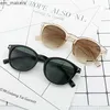 Okrągłe okulary przeciwsłoneczne w kształcie litery T 2023 Nowe okulary przeciwsłoneczne modne