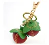 Netter Kuhladen -Leder -Straberry -Luxusdesignerin Keychain für das Handwerk von Frauen Schmuckzubehör Tasche Charme Geschenk Porte Clef Femme 240301