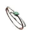 Ontwerper Tiffay armband knoop nieuw product ingelegd met groene diamant V goud fashion design geavanceerde persoonlijkheid vlinder touw gewikkeld Hot