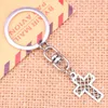 Nyckelringar 20st Fashion Keychain 24x16mm Hollow Grid Cross Pendants Diy Men smycken bil Key Chain Ring Holder Souvenir för gåva