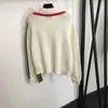 Femmes Knits Tees Designer 2024 Nouveau élégant femmes GG broderie lettre col rabattu à manches longues laine tricoté cardigan fermeture éclair manteau blanc 36NX