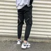 Streetwear Black Mens Harem Joggers Pants Męski ładunek Hip Hop swobodny kieszenie dresowe spusty mody 240226