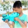Zabawki z pistoletu dinozaur broń wodna symulacja symulacja dinozaura na ciśnienie broni wodnej letnie strzelanie na świeżym powietrzu w wodę rodzic-dziecko interaktywna zabawka