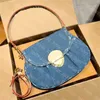 Kot mavisi tüm el çantalarını taşıyın kadın tasarımcı kuzen crossbody çantalar yüksek kaliteli sırt çantaları küçük boston omuz çantası kot hobo tote çanta