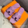 2024 Top Designer One Sandals Slipper Oranss New Lady Edition Spring H Family Sheepskin Early Macaron Series Versatile Flat Bottom Step Single Shoes Evla