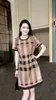 Hoge 2024-versie lente herfst nieuwe geruite damesjurk met korte mouwen en lange herfst Koreaanse versie slanke jurk