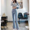 Jeans a fessura di colore chiaro Jeans casual Corea Moda Abbigliamento primaverile da donna Nuova vita alta Mostra pantaloni sottili Pantaloni svasati micro 2023 Nuovo