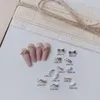 100pcs Alloy Gold Silver Braided Twist Curved Knot Rivets Studs Metal Manicure Nail Art Accessories DIY Nails Decoration Charms 240301