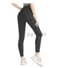 Aktywne spodnie legginsy Projektanty luksusowe spodnie dresowe joga fitness Mat Mat Mat Side Pocket Brzoskwiniowe rajstopy Sheer Joggers Seksowne czarne joggery biegające 2438