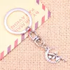 Keychains 20st Fashion Keychain 25x14mm Fairy Angel Moon Star Pendants Diy Men smycken bil Key Chain Ring Holder Souvenir för gåva