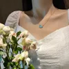 Designer colar vancf colar de luxo diamante ágata 18k ouro v família dourada céu puro azul borboleta colar para mulheres a cadeia high-end