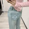 Jean designer pour femmes en jean skinny taille haute avec design de lettre de revers blanc et pantalon en jean à longueur droite