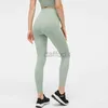 Pantalones activos Medias de talle alto Sin línea en T Fitness Yoga Pantalones de chándal con sentido desnudo Leggings elásticos para mujer Pantalones deportivos de color sólido con bolsillo en la cintura 240308