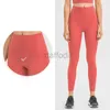 Pantalones activos Medias de talle alto Sin línea en T Fitness Yoga Pantalones de chándal con sentido desnudo Leggings elásticos para mujer Pantalones deportivos de color sólido con bolsillo en la cintura 240308