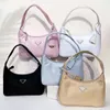إعادة Edition 2000 2005 Nylon Small Handbag Designer Bag Bag Triangle Luxurys Houtter Counter Luttararm Safino Bag Bag Bag Bag Bag Bag Tote Pochette Mens Crossbody Clutch Bags