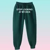 Spodnie dresowe mężczyźni Kobiety Joggers przestań patrzeć na moje penisowe spodnie dresowe hip -hop print print z wysokim talią spodnie uliczne dresowe hipis y13908502