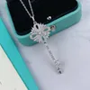 Top Quality Diamond Pendant Designer Necklace S Sterling Sier Gold Key Necklaces for Women Fashion Sweater Chain Fancy Dress Chain Jewelry