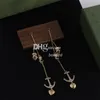 Boucles d'oreilles de chaîne en or de créateur pendantes boucles d'oreilles plaquées lettre élégante avec boîte pour la date de fête