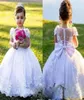 2022 Country Flower Girl Robes Bow Back Blanc Ivoire Robe De Bal Jewel Cap Manches Longueur De Plancher Filles Pageant Robe Avec Dentelle Appli3764566