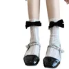 Chaussettes en dentelle transparente pour femmes, nœud papillon à la cheville, maille ajourée, mollet ample