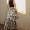 Kjolar Spring Autumn Fairy Sliver Ruffled Pu Leather Midi Tiered kjol Kvinnor Hög midja Långa lyxdesigner Kläder 2024