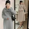 Umstandskleider Koreanischer Stil Herbst und Winter Neues Pulloverkleid für schwangere Frauen Kapuzenpullover Side Split Umstands-Hoodies Lange Sweatshirts L240308