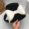 Sombreros de ala ancha Sombreros de cubo Socialité británica Hepburn viento pequeño ala grande desfile de moda cara lavabo sombrero bowknot Janese mujer qiu dong pequeño pescador L240305