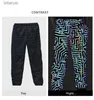 Pantaloni Pantaloni da uomo Coulple Linee geometriche del circuito Giacca a vento colorata all'anca Rifletti i pantaloni leggeri Jaqueta Masculina 240308