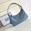 إعادة Edition 2000 2005 Nylon Small Handbag Designer Bag Bag Triangle Luxurys Houtter Counter Luttararm Safino Bag Bag Bag Bag Bag Bag Tote Pochette Mens Crossbody Clutch Bags