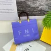 Venda de fábrica 50% de desconto bolsas de designer de moda quente nova celebridade lin mesmo estilo sacola carta um ombro bolsa das mulheres grande capacidade