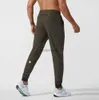 Mäns Lululemen Man Lulu Short Yoga Outfit Jogger Sport Snabbt Dry DrawString Gym Sweatpants Byxor Elastisk midja Fitness All-Match 240308